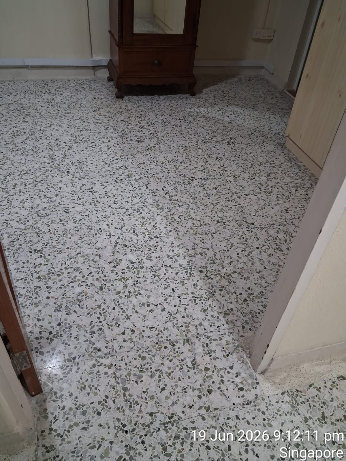 Freshly polished terrazzo bedroom floor with satin finish