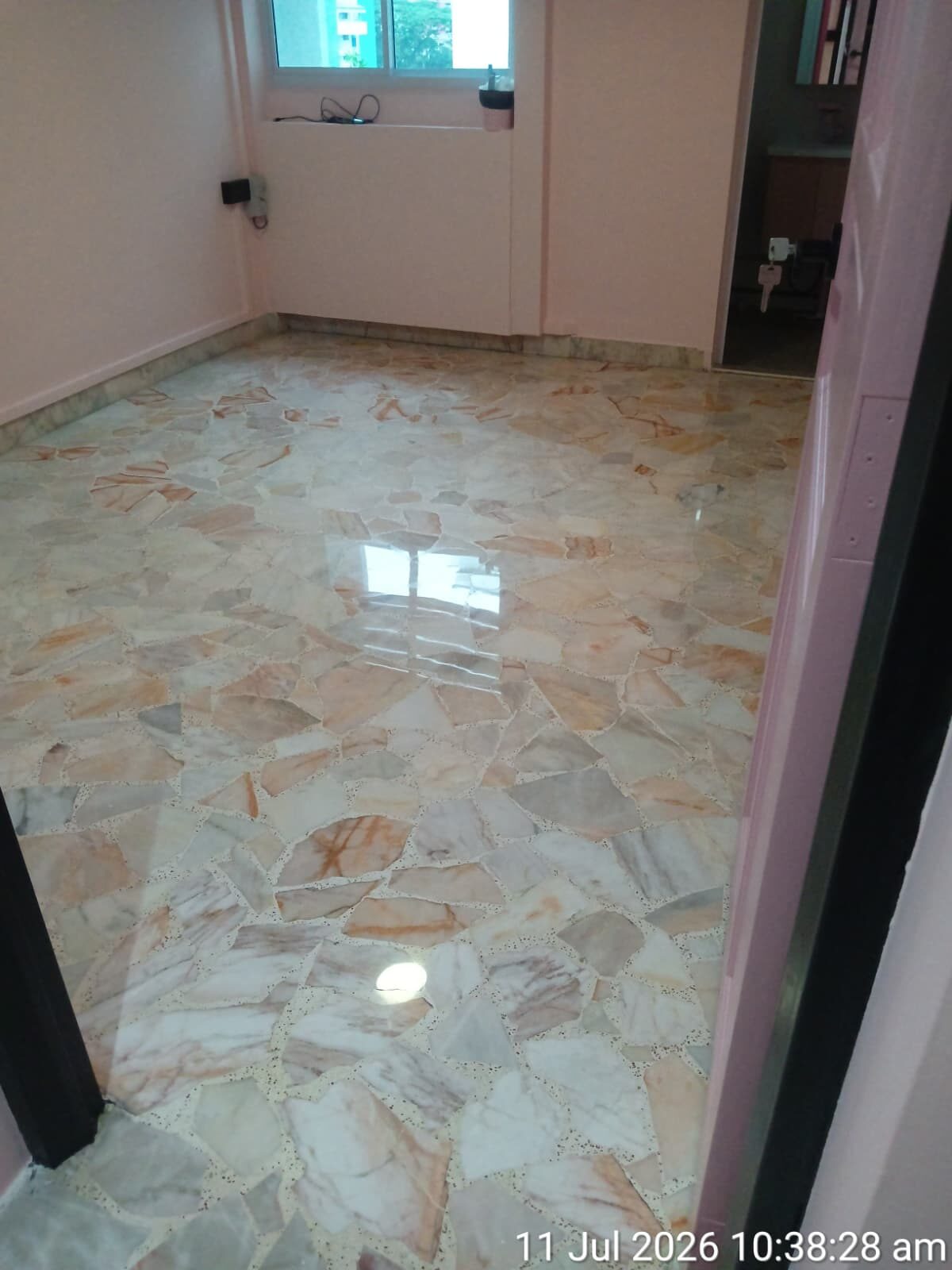 Freshly polished terrazzo bedroom floor, second visit
